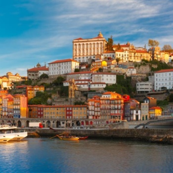 Douro river, Ribeira and Dom Luis I or Luiz I iron bridge in the sunny morning Porto, Portugal.